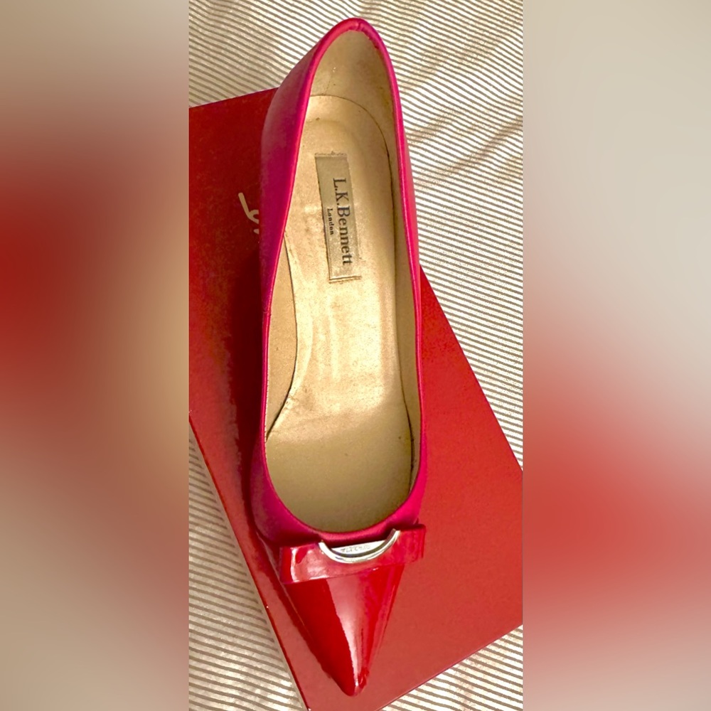 LK Bennett of London 
Red patent leather and hot pink heels size 8
